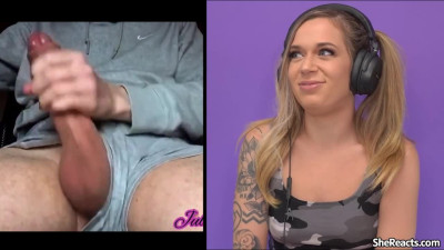 Attractive blonde woman is reacting to a solo video