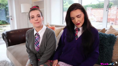 Lesbian girls in schoolgirl outfits putting on a show